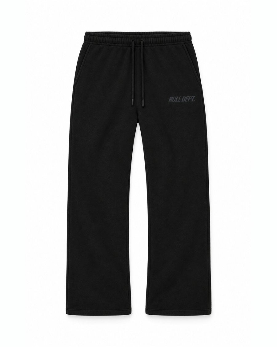 ROLL DEPT. sweatpants in black, front view
